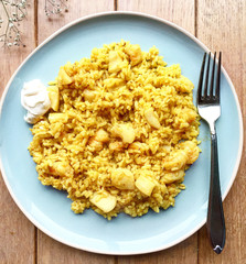 Seafood paella on blue plate