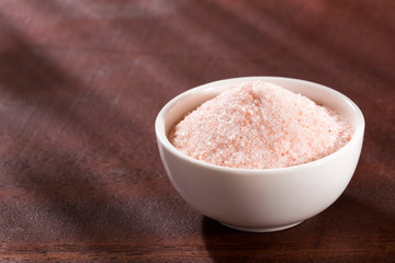 Fine pink Himalayan salt in a ceramic bowl