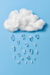 a fluffy cloud raining quartz crystals