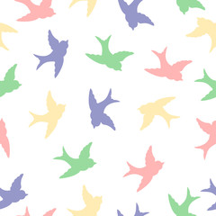 Obraz na płótnie Canvas Multicolor swallow birds seamless pattern background, design for wrapping paper, springtime decoration with swallows