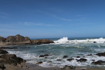Fototapeta na wymiar Landscape of rocks and waves on the Pacific Ocean at Point Reyes National Seashore in California