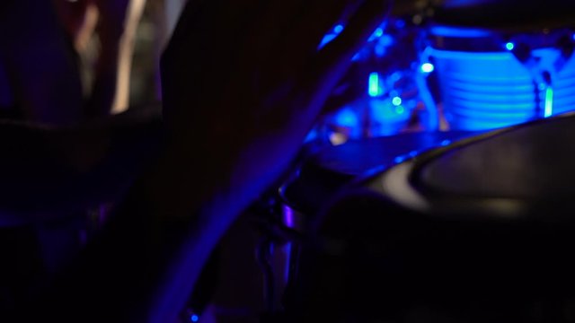 Closeup of bongo drummer performing