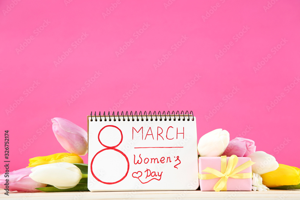 Wall mural text 8 march womens day with tulip flowers and gift box on pink background