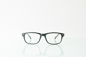 eye glass isolated on white background with reflection. copy space. high key
