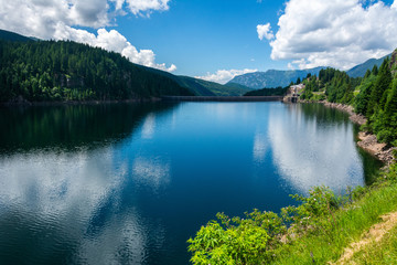 Lago di Paneveggio artifical lake in the Fiemme valley of Trentino, Italy