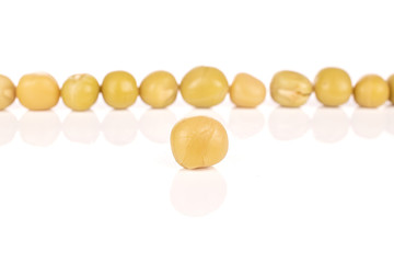 Lot of whole canned pea one in front isolated on white background