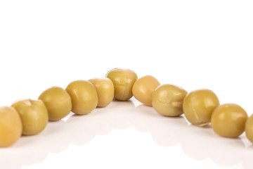 Lot of whole canned pea isolated on white background