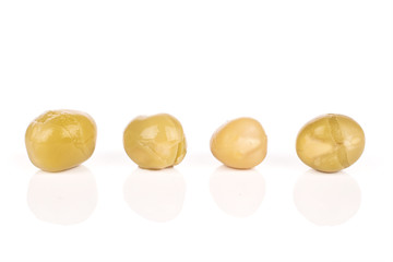 Group of four whole canned pea isolated on white background