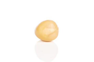 One whole canned pea isolated on white background