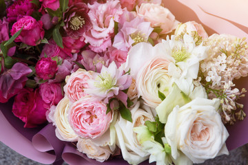 Floral background, texture. Rich elegant wedding bouquet, flowers arrangement by florist with white and pink roses close up, macro	