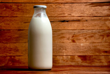 milk bottle on a wooden background