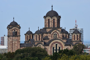 Fototapeta na wymiar Church of St. Mark in Belgrade on Tasmajdan.City in background