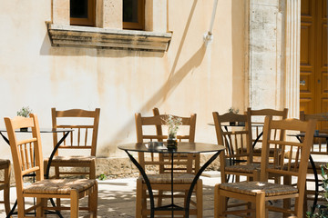 Fototapeta na wymiar Chairs and table outdoors
