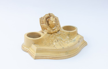 Antique fayence inkwell with foxhead - porcelain inkstand with noble signs isolated on white background