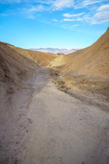 hikink the golden canyon - gower gulch circuit in death valley, california, usa