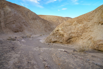 hikink the golden canyon - gower gulch circuit in death valley, california, usa