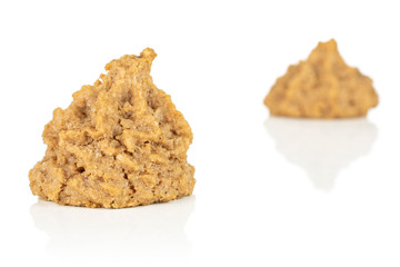 Group of two whole homemade brown coconut biscuit with chocolate isolated on white background