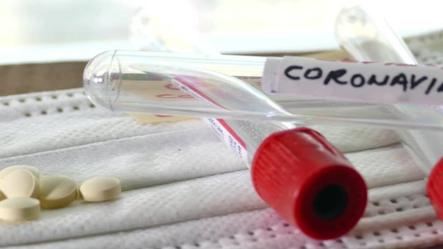 Medical protective mask Coronavirus alias covid-19 with blood tube
