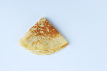 pancakes on Shrovetide on a white background. seeing off winter. spring treats