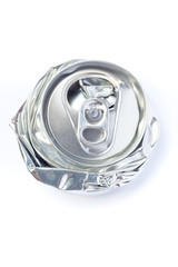 Top view close up of crumpled silver aluminum can isolated on white background, unpainted and selective focus. Concept of drinks, industry, soda, beer, model, manufactures, recycling and object.