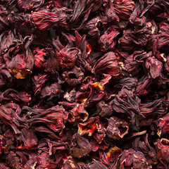 The dry petals of aromatic tea carcade close up