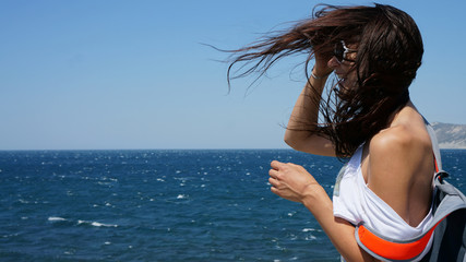 Sea breeze ruffled the girl's hair, Black Sea, Russia.