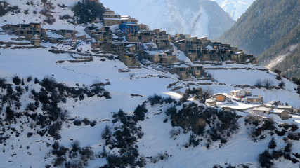 Annapurna Circuit track. View at traditional nepalese Upper Pisang village.