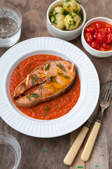Wild Salmon Steak with Roasted Tomato Sauce Garnished with Dill and Lemon Zest