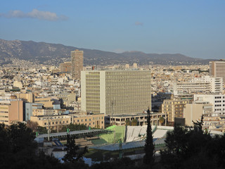Zoom photo of urban dense populated city of Athens as seen from Lycabettus hill at spring, Attica,...
