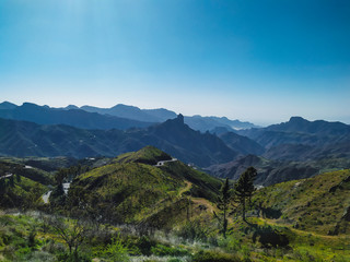 Green valley landscape with a sky blue in autumn at sunset