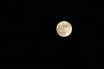 Detailed and isolated full moon on deep black space. Astrology object