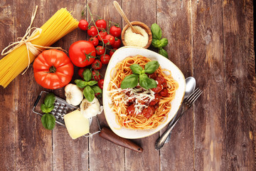 Spaghetti pasta with meatballs and tomato sauce with basil and parmesan