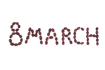 Inscription March 8 made of coffee beans,isolated on white background.