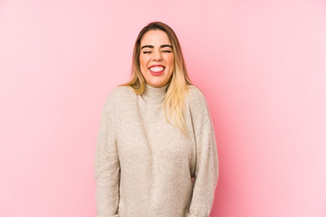 Fototapeta premium Middle age woman over isolated background laughs and closes eyes, feels relaxed and happy.
