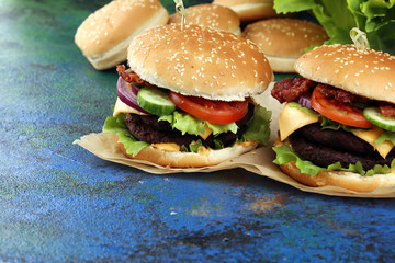 Tasty fresh meat burgers with salad and cheese. Homemade angus burger.