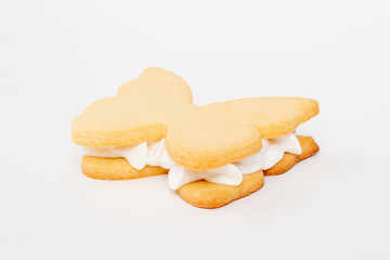 Cooking dough from a butterfly shape on a white background