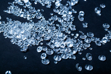 Beautiful transparent crystals on black background. Shiny diamonds. Luxury diamonds. Diamond jewel