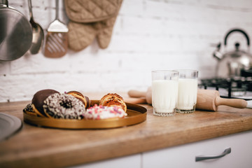beautiful composition of sweets and milk in the kitchen