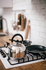 kettle and pans on the stove