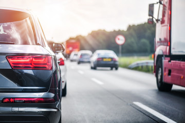 Car rush hours city street. Cars on highway in traffic jam