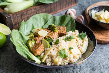 Tempeh with rice, bok choy, steamed broccoli and bamboo shoots