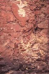 ugly red brick wall background. chaotic street building texture