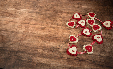 Some hearts on the wooden background. Background for the valentines day