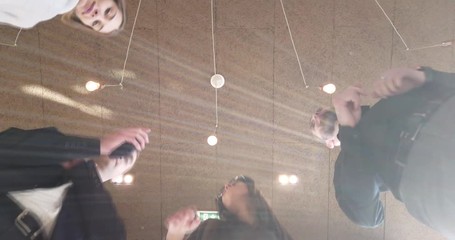 Motivated funny diverse business team people dancing celebrating success at corporate party on friday, happy friendly multiracial coworkers group having fun together enjoy victory dance during brake. - Powered by Adobe