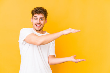  shocked and amazed holding a copy space between hands.