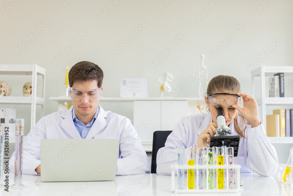 Poster concept of a healthcare researcher, a researcher working in a life science lab, a young research sci