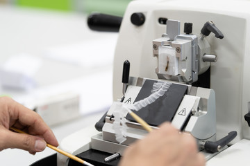 Rotary Microtome Section for diagnosis in pathology make microscope slide histology.