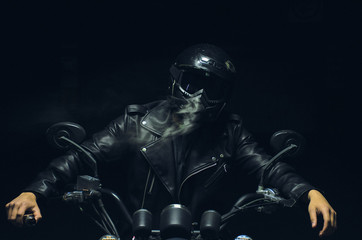 motorcyclist with smoke in the dark © Diego