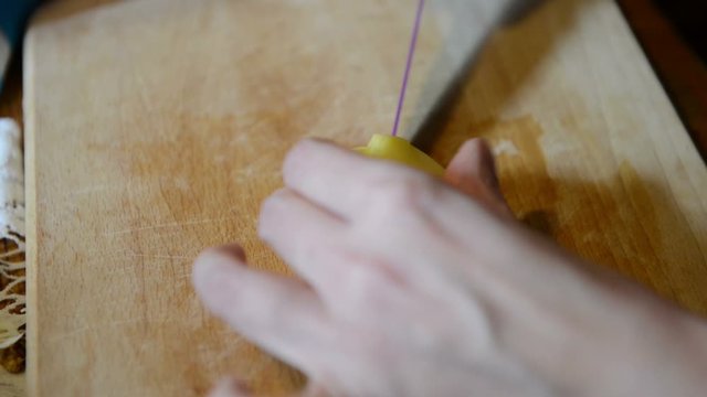 Preparing Vegetable Meal. Cutting Potatoes In Small Pieces To Cook A Soup.