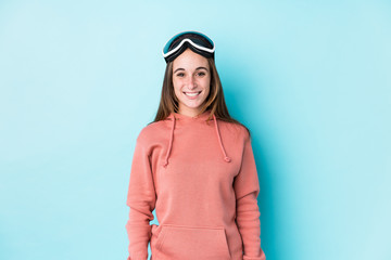 Young skier woman isolated happy, smiling and cheerful.